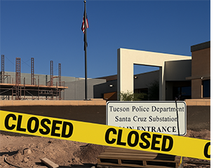 Exterior of ODS substation under construction with yellow tape that says, "Closed."