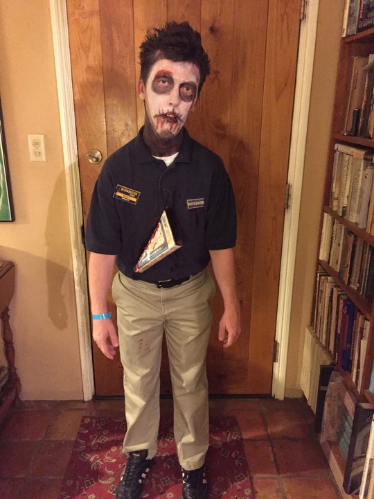 Photo of Brian Dahl as a Blockbuster zombie.