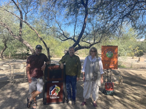 Photo of Council Member Dahl, Jace Mortensen, and Vicki Barth with the future dog park behind them. 