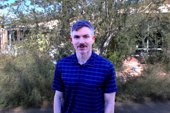 Photo of new Ward 3 Council Aide Jonathan Courtney standing outside the Ward 3 office.