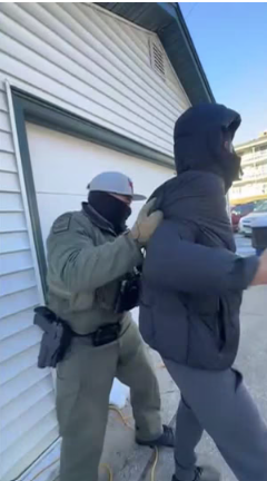 Photo of Ramon Menera getting apprehended by Border Patrol due to his accent.