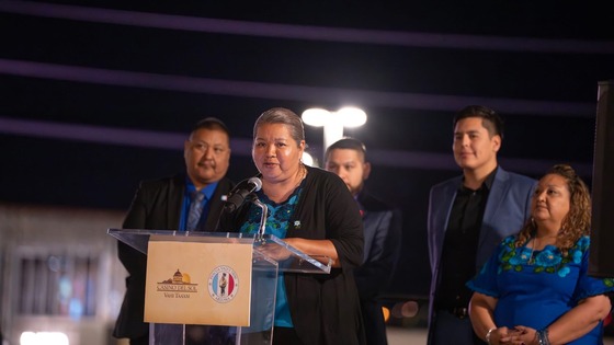 Photo of Yaqui Council Member Gloria Alvarez Gomez addressing attendees.