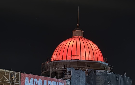 Photo of Casino del Sol Vahi Taa’am’s copper dome lit.