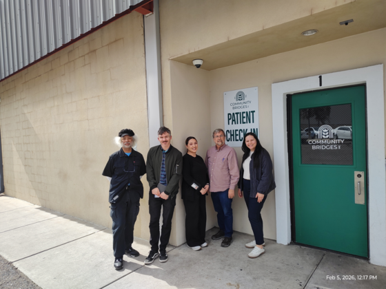 photo of Mike, Jon, Lindsey Telles, Council Member Dahl, and Naomi at the SAFR entrance.