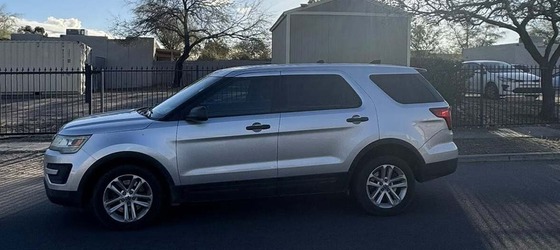 Photo of woman's car left on the street after ICE abduction.