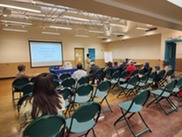City Staff presenting at community meeting