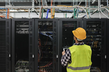 Technician Working in Data Center