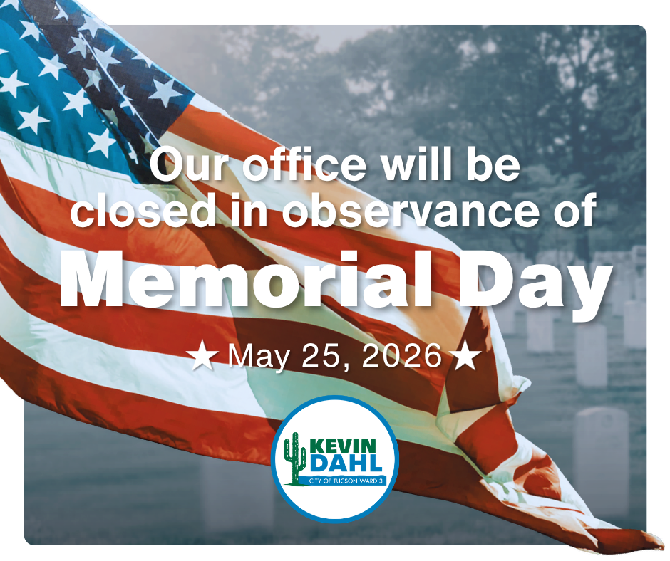Memorial Day graphic of a flag waving with a cemetery in the background.