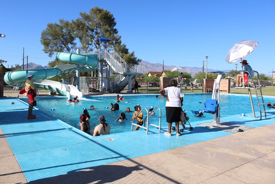 Photo of kids and families swimming and enjoying the pool at Doris J. Thompson park.
