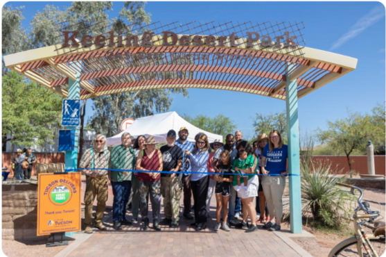 Council Member Dahl, Mayor Romero, neighbors, and City staff cutting the ribbon at Keeling Desert Park. Photo courtesy of Kathleen Dreier.