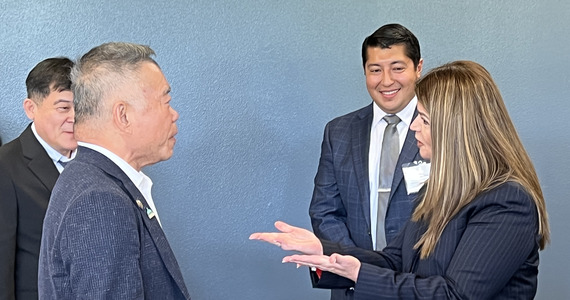 Mayor Regina Romero speaks with Hoton Chang, CEO of Grand Process Technology Corporation