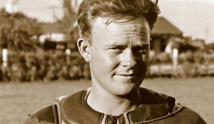 John "Button" Salmon in a 1920's era football uniform 