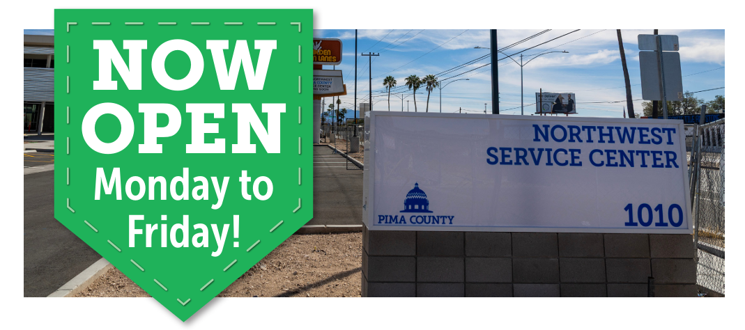 sign that reads Northwest Service Center in blue text and a note saying NOW OPEN Monday to Friday! 