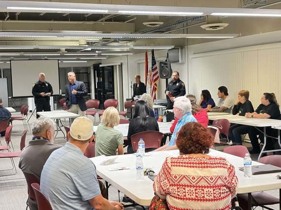 Councilmember Cunningham speaks to the community at TPD's regular Division Advisory Council meeting at the Ward 2 office