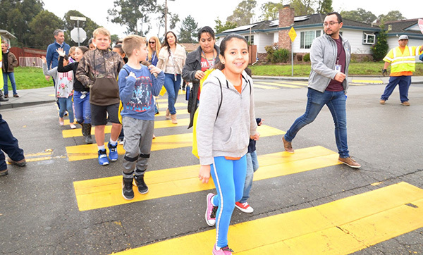 children using crosswalk