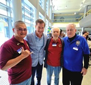 Supervisor Haubert smiles for a picture with Mission San Jose Rotary Club members