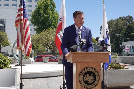 Supervisor Haubert speaking at podium for Point In Time Count