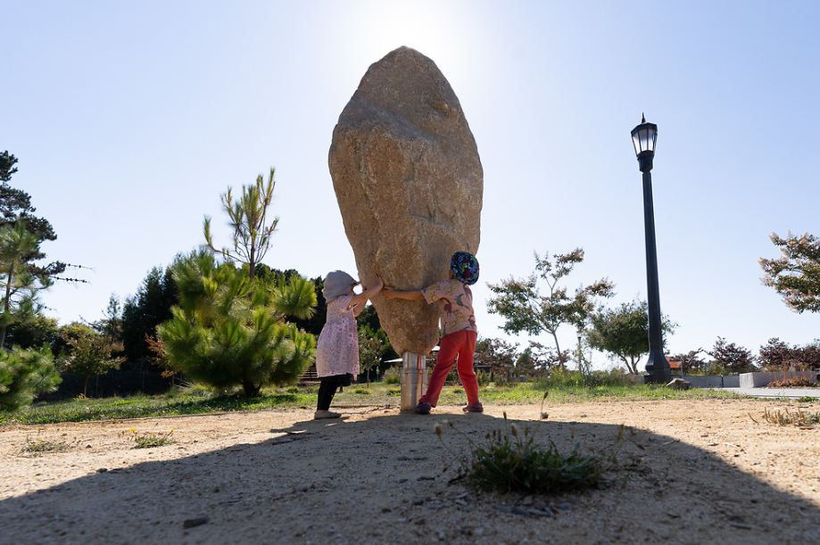 photo of kids playing at new rockspinner public art