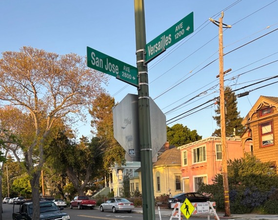 Photo of street signs: Versailles and San Jose
