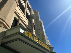 Photo of a neon marquee with the words, "Civic Center Parking"