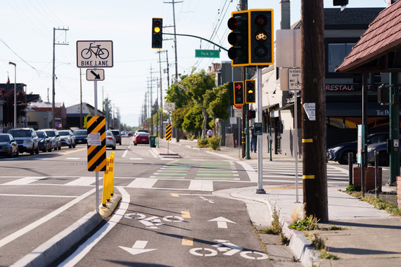 Photo of bike lanes and bike signal on Clement Ave crossing Park St