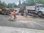 Sewer Rehab - Image of crews working on roadway