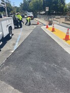 Public Works Crews working on asphalt
