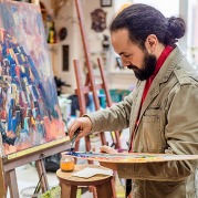 Artist working in his studio