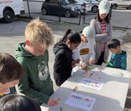 Participates at the shamrock scavenger hunt