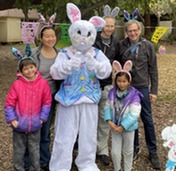 Photo of attendees with the bunny at the egg hunt
