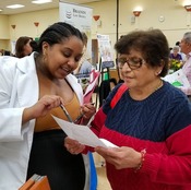 Photo of two people at the senior showcase fair