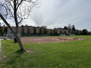 Image of baseball field with large puddle