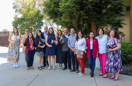 City council, elected officials, speakers, and staff at the Pride flag raising event 