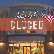 Front of City Hall with Text "July 4th, Closed"