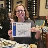 Brigitte Shearer with Award certificate 