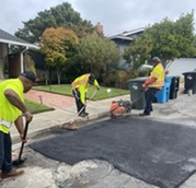 Staff Finishing New Asphalt