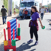 Playing connect four and in line for ice cream at Caltrain Launch Party