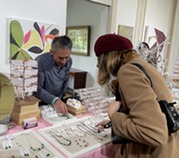 Vendor and customer at the craft fair
