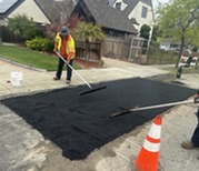 Preparing to Finish New Asphalt