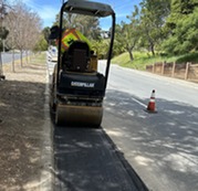 Finishing new asphalt 