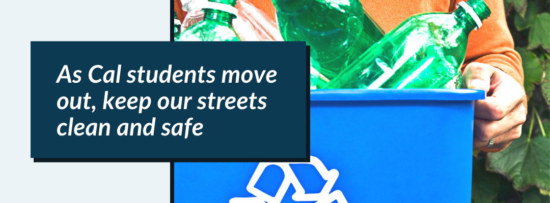 Picture of person carrying a blue bin with recyclable bottles