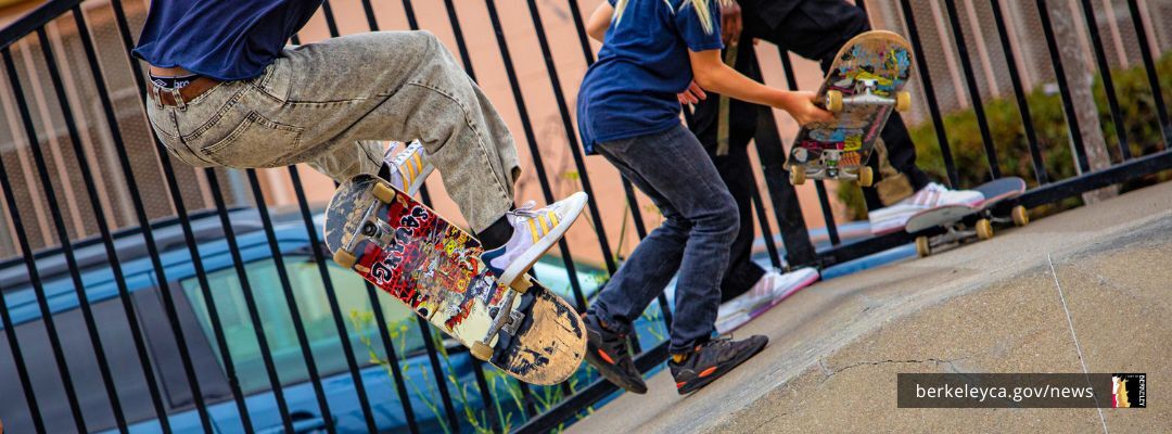 People perform tricks at skate park