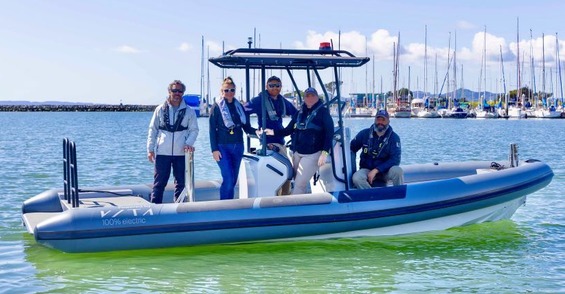 city staff riding boat