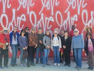 Senior Center Members in front of mural
