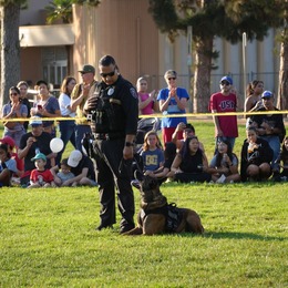 Photo of K-9 and CCPD Officer at Veterans Memorial Park