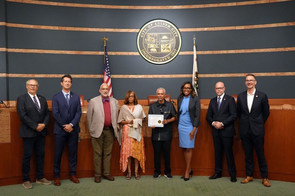 Photo of people from Realty Executives Westside receiving recognition from the City Council