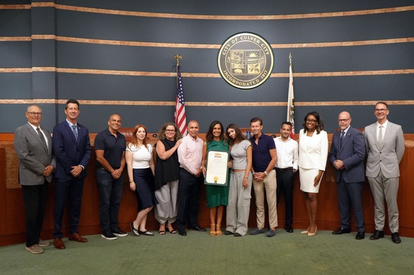 Photo of staff of the Culver Hotel posing with the City Council