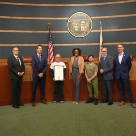 Photo of City Council with October proclamation