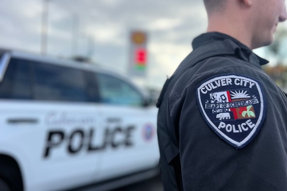 Photo of CCPD officer and vehicle
