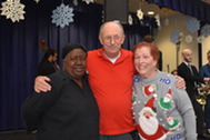 Older Adults posing for a Holiday picture